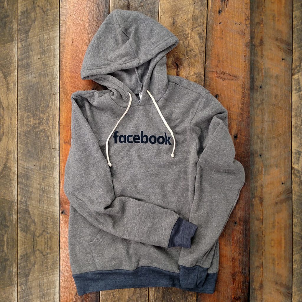 • Eco-Fleece™ 
• 50% Polyester, 46% Cotton, 4% Rayon
• Kangaroo Pocket
• Ribbed Hemband and Sleeve Cuffs
• Hoodie w/ Drawchords
• Contains Organic & Recycled Materials
• Eco Grey and Eco True Navy 
• Facebook wordmark on front chest