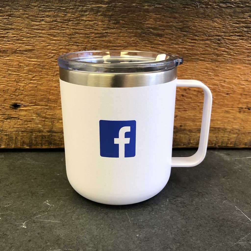 • White powder coated 
• Great for home, office or daily travel! 
• Double wall 18/8 stainless steel thermal mug with copper vacuum insulation
• Stainless steel rim
• Clear push-on lid, swivel closure
• Gift box included
• Hot 8 hours and cold 16 hours
• Facebook favicon in blue